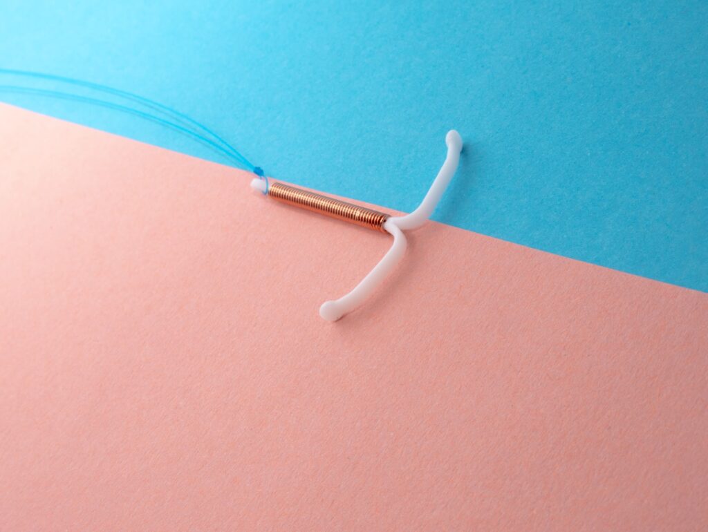 A copper IUD with strings. 